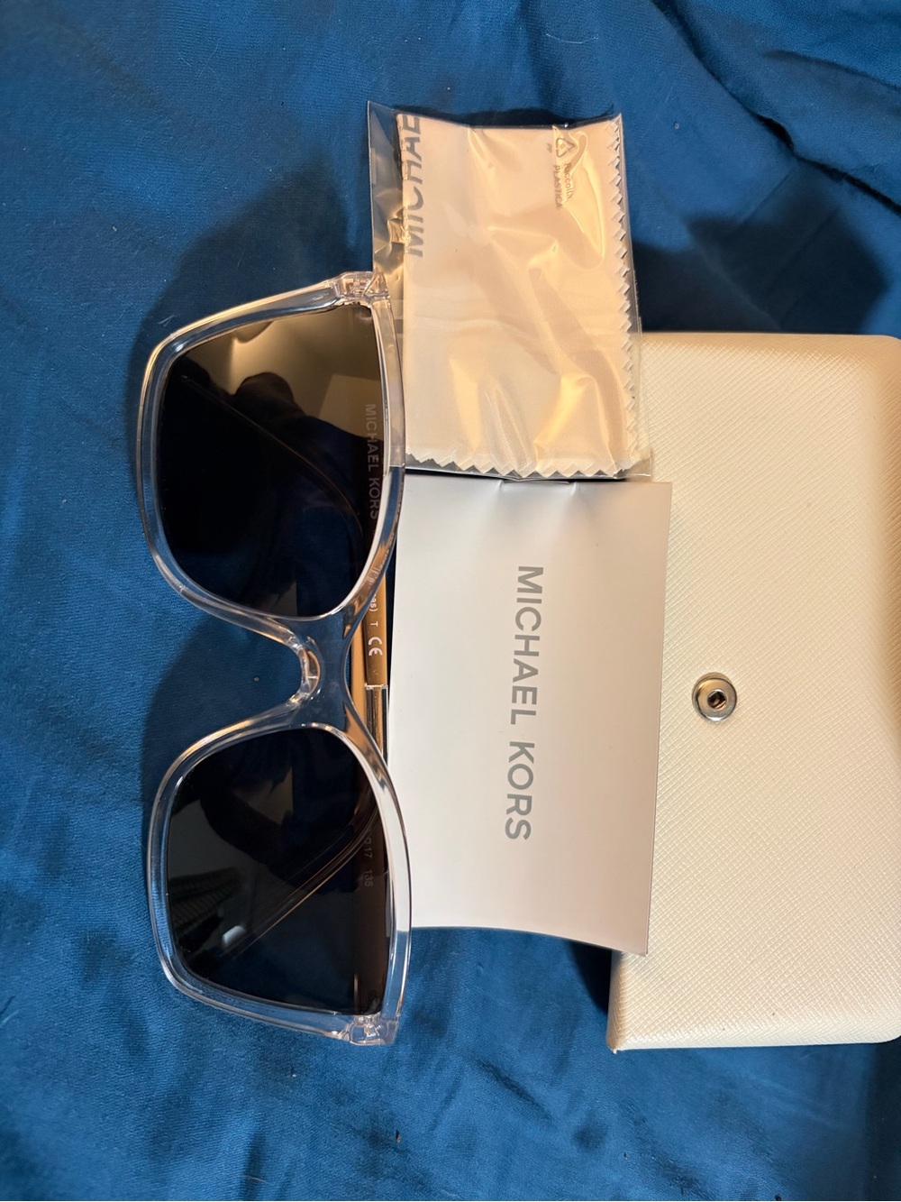 Michael Kors clear frames, gold arms. These are prescription readers